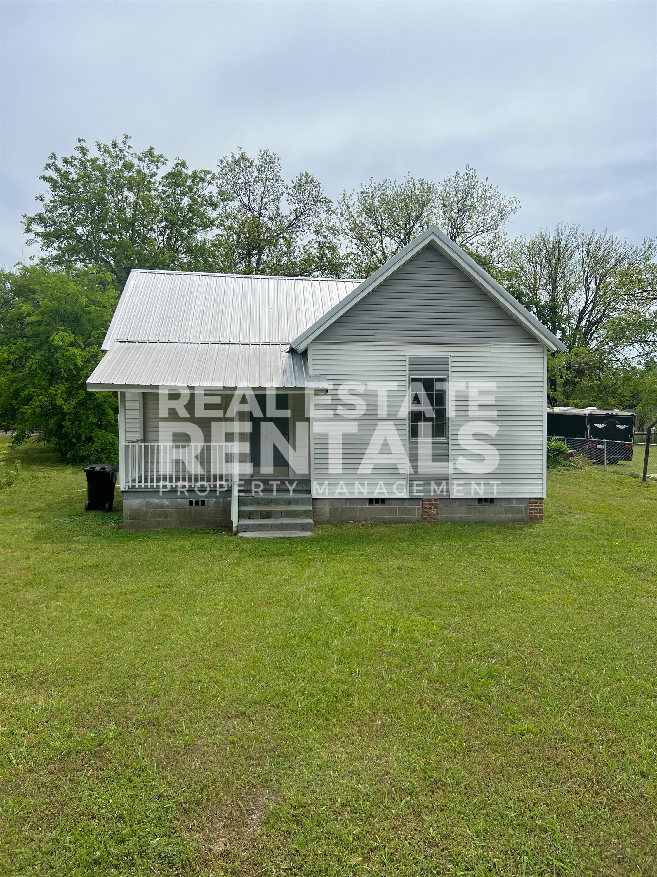 21 W Wilkinson Ave., 1